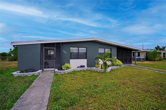 view of front of home with a front yard