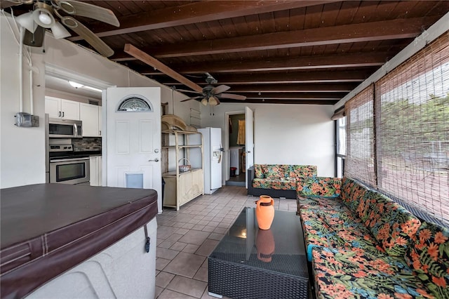 living room featuring wooden ceiling, ceiling fan, tile patterned floors, and beamed ceiling