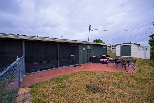 view of yard featuring a patio area and a shed