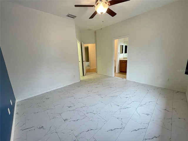 unfurnished room with ceiling fan