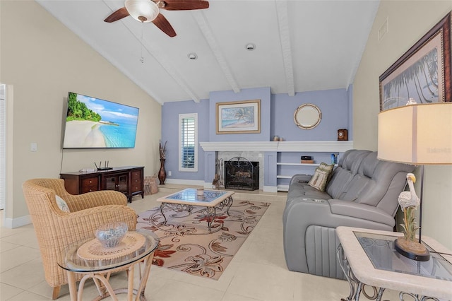 tiled living room with a premium fireplace, ceiling fan, and lofted ceiling with beams