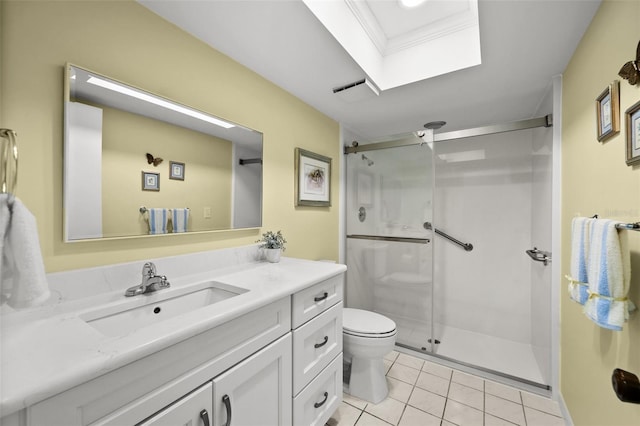 bathroom featuring vanity, toilet, crown molding, and walk in shower