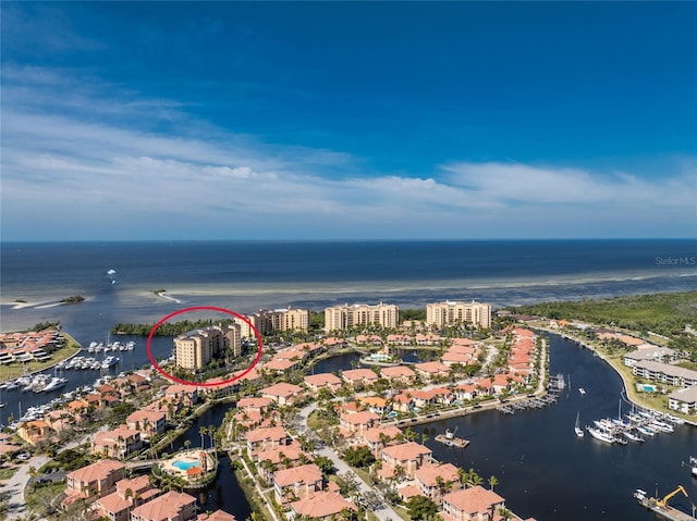 aerial view with a water view and a city view