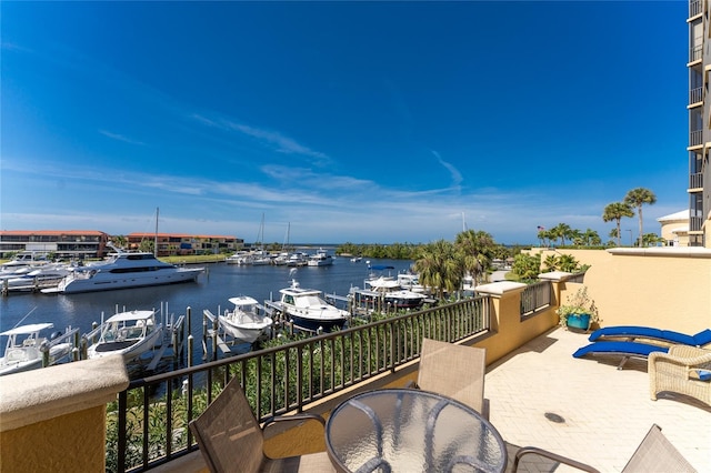 view of patio with a water view