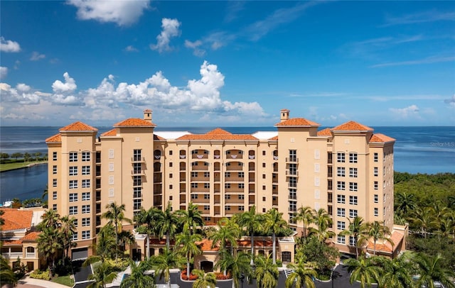 view of property with a water view