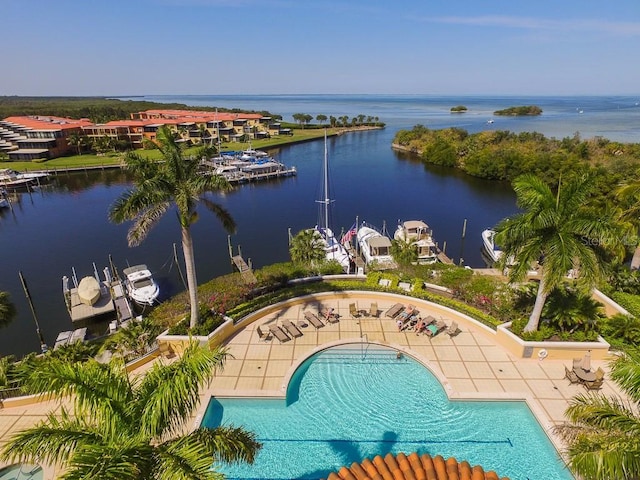 birds eye view of property featuring a water view