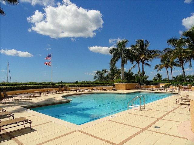 pool with a patio area