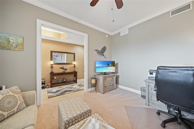 carpeted office featuring ceiling fan and ornamental molding