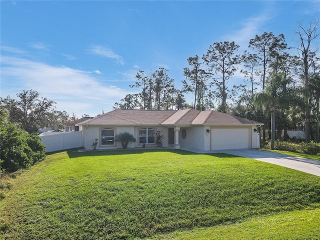 ranch-style house with a garage and a front lawn