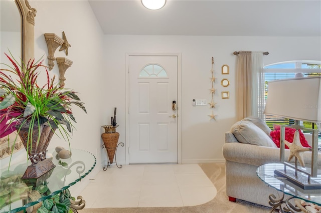 foyer with light tile patterned floors