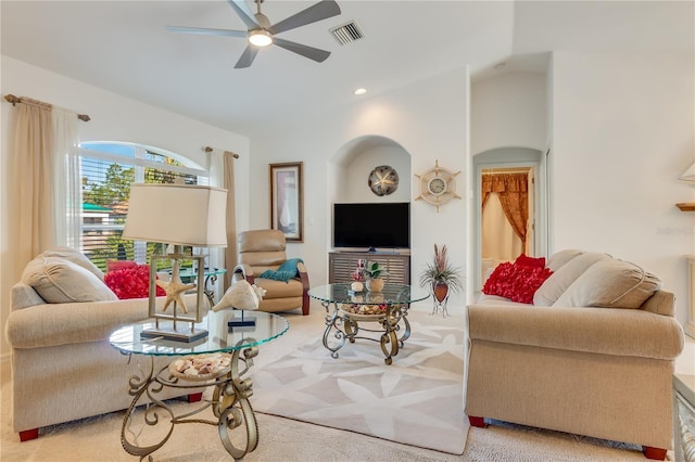 living room featuring ceiling fan and light carpet