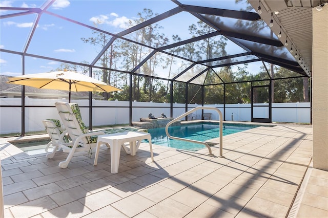 view of pool featuring a patio area and a lanai