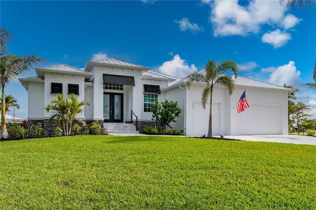 view of front facade featuring french doors, a garage, and a front lawn