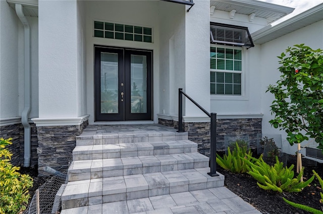 doorway to property with french doors