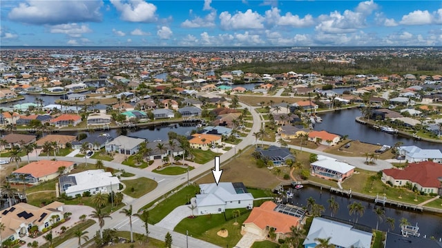 drone / aerial view with a water view