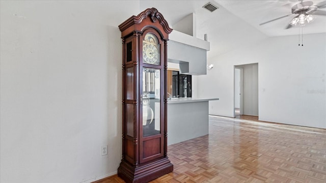 interior space featuring ceiling fan and light parquet floors