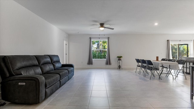 2784 Dode Ave, North Port, FL 34288 - living room featuring a ceiling fan, light tile patterned floors, and recessed lighting