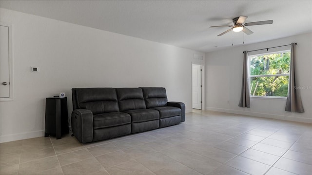 2784 Dode Ave, North Port, FL 34288 - living area with ceiling fan and light tile patterned flooring