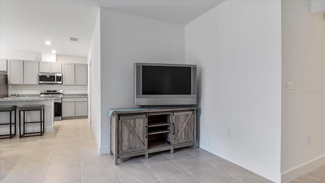 2784 Dode Ave, North Port, FL 34288 - living area featuring light tile patterned floors and recessed lighting