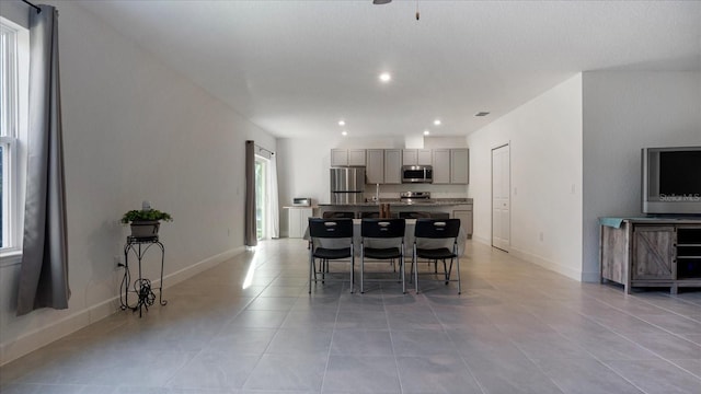 2784 Dode Ave, North Port, FL 34288 - dining room featuring light tile patterned flooring and recessed lighting