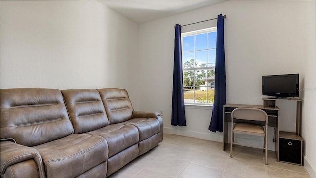 2784 Dode Ave, North Port, FL 34288 - living area with plenty of natural light and light tile patterned floors