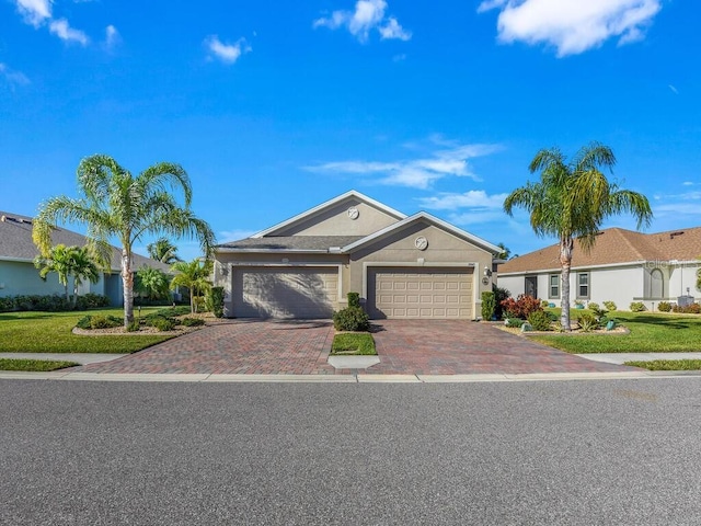 single story home featuring a garage