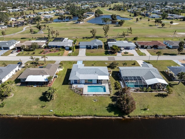 drone / aerial view with a water view