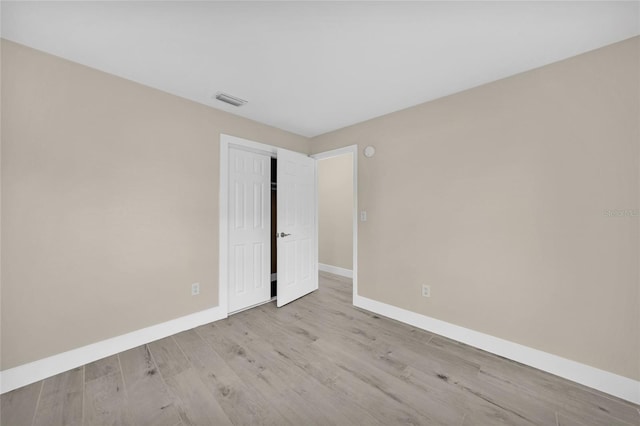 empty room featuring light hardwood / wood-style floors