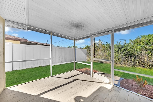 unfurnished sunroom with a healthy amount of sunlight