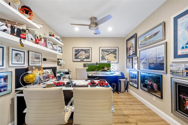 office area with ceiling fan and light hardwood / wood-style flooring