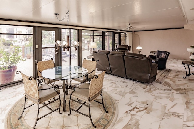 dining area with french doors and ceiling fan