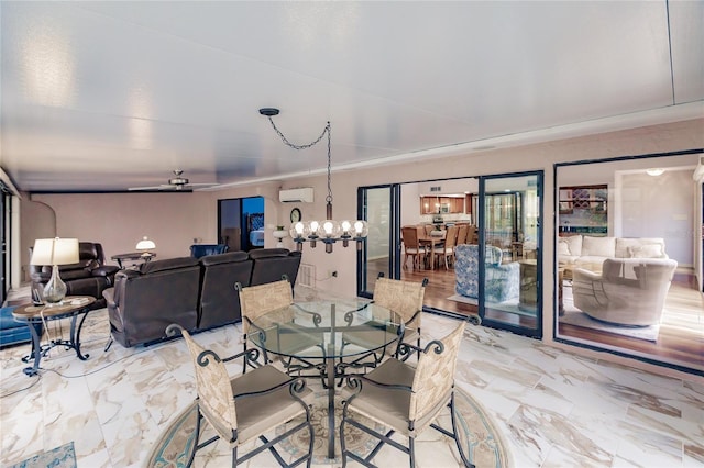 dining room with ceiling fan with notable chandelier and a wall unit AC