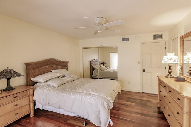 bedroom featuring dark hardwood / wood-style flooring and ceiling fan