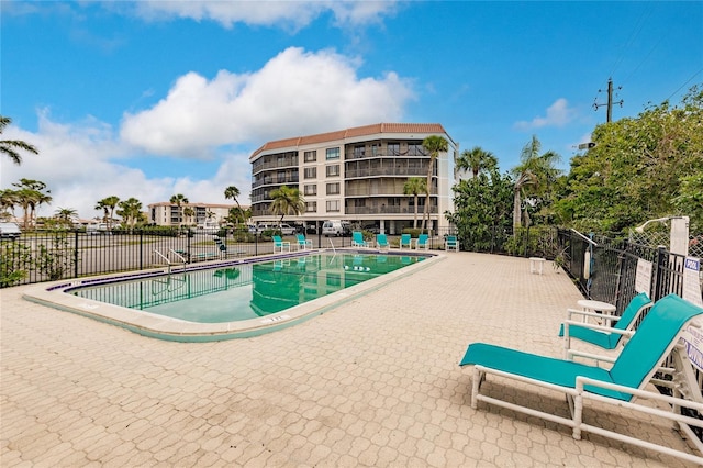 view of swimming pool featuring a patio