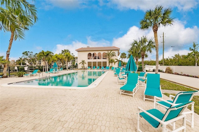 view of swimming pool featuring a patio area