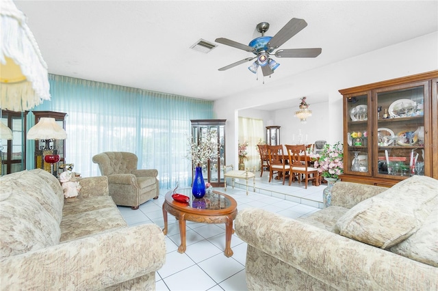 tiled living room featuring ceiling fan