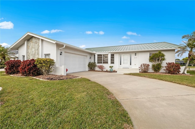 ranch-style home featuring a front yard and a garage