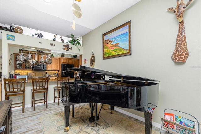 miscellaneous room with light hardwood / wood-style floors