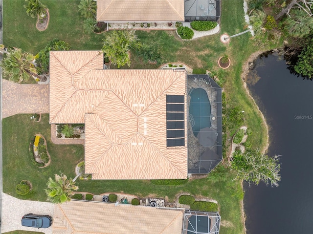 bird's eye view with a water view