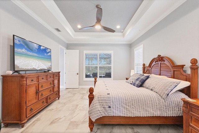 bedroom featuring ceiling fan, a raised ceiling, and crown molding