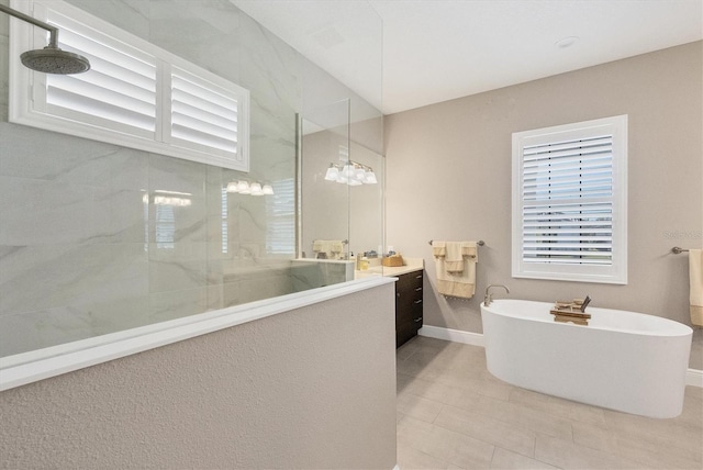 bathroom with tile patterned flooring, vanity, and independent shower and bath