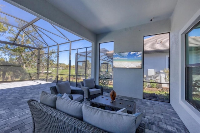 view of patio / terrace with glass enclosure and an outdoor hangout area