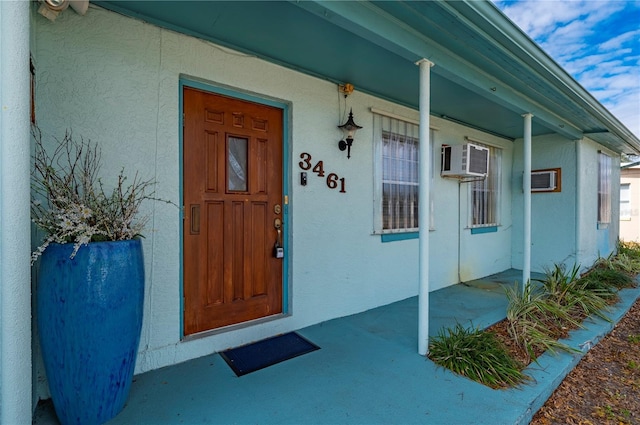 doorway to property with a porch