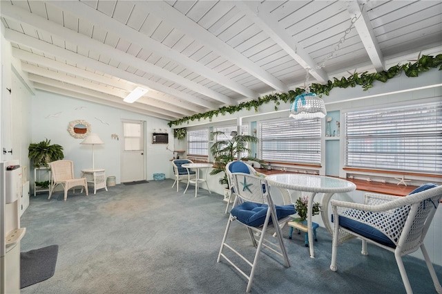 sunroom featuring vaulted ceiling with beams and wood ceiling