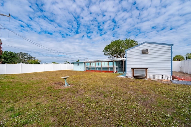 rear view of property with a lawn