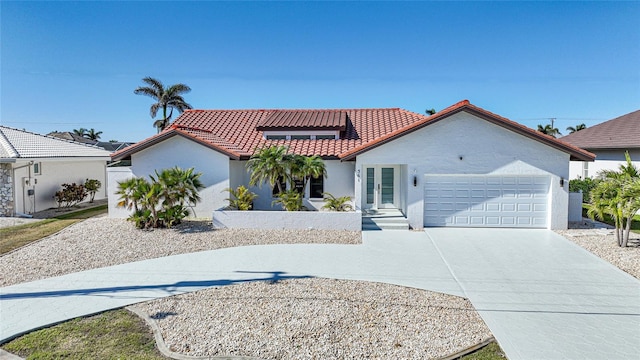 view of front of home with a garage