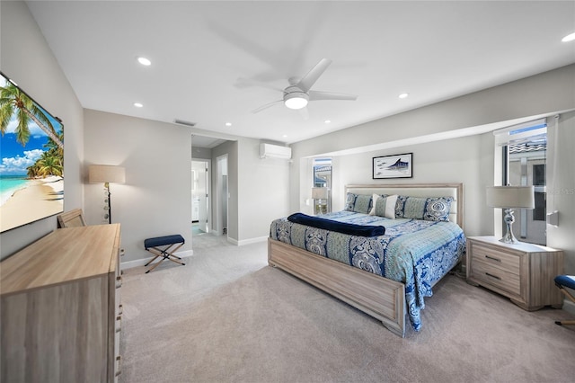 bedroom with an AC wall unit, ceiling fan, and light carpet