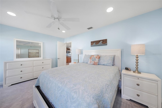 carpeted bedroom with ceiling fan