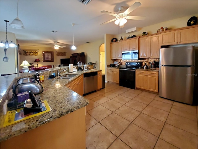 kitchen with appliances with stainless steel finishes, ceiling fan, sink, light tile patterned flooring, and tasteful backsplash