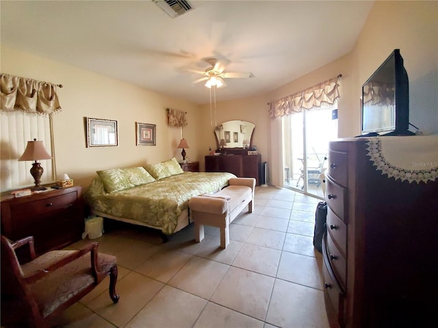 tiled bedroom featuring access to outside and ceiling fan